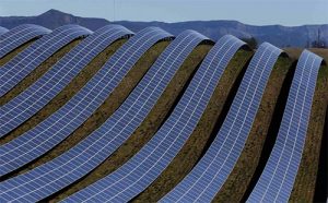 solar panels on rolling hills