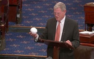 Senator James Inhofe using a snowball to confirm his bias